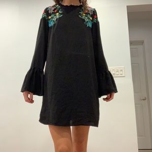 Black long sleeve mini dress w/ floral appliqué